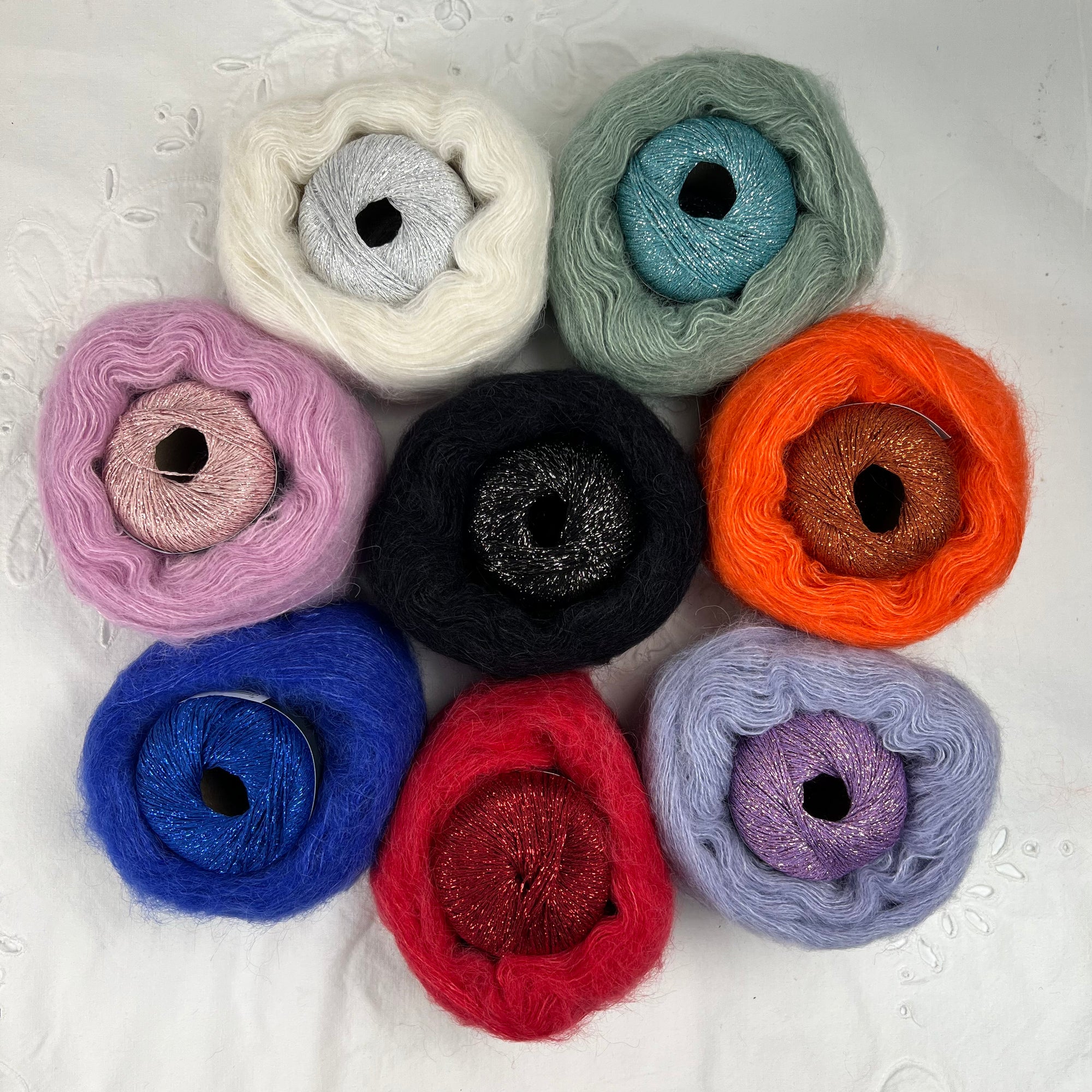Eight colorway options arranged in a circle.